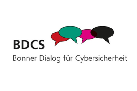 Das Bild zeigt das Logo des Bonner Dialogs für Cybersicherheit, BDCS, mit verschiedenfarbigen Sprechblasen.
